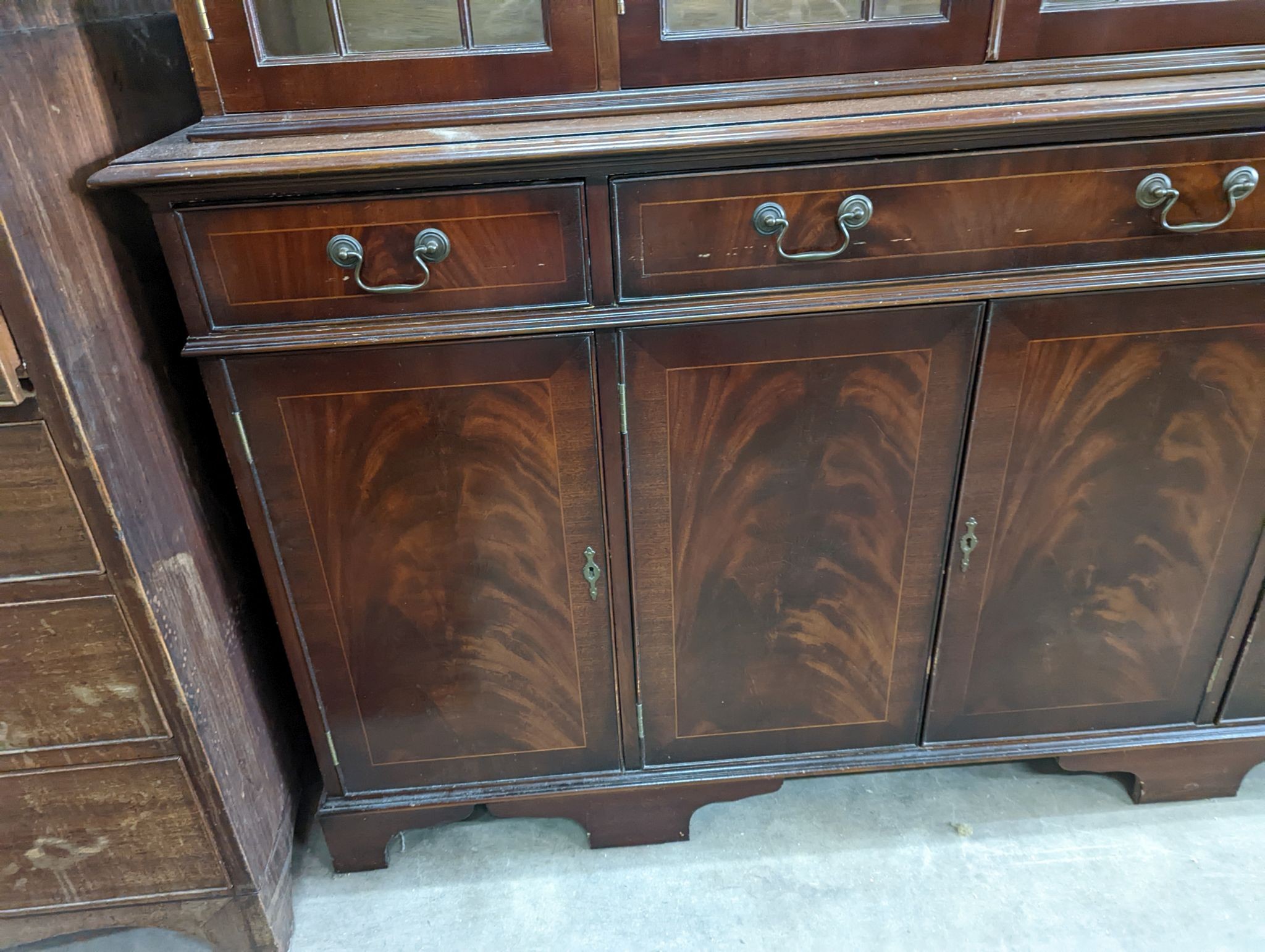 A reproduction George III style mahogany library bookcase, length 154cm, depth 41cm, height 193cm